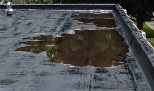 How Ponding Water Affects Commercial Roofs and What to do About it